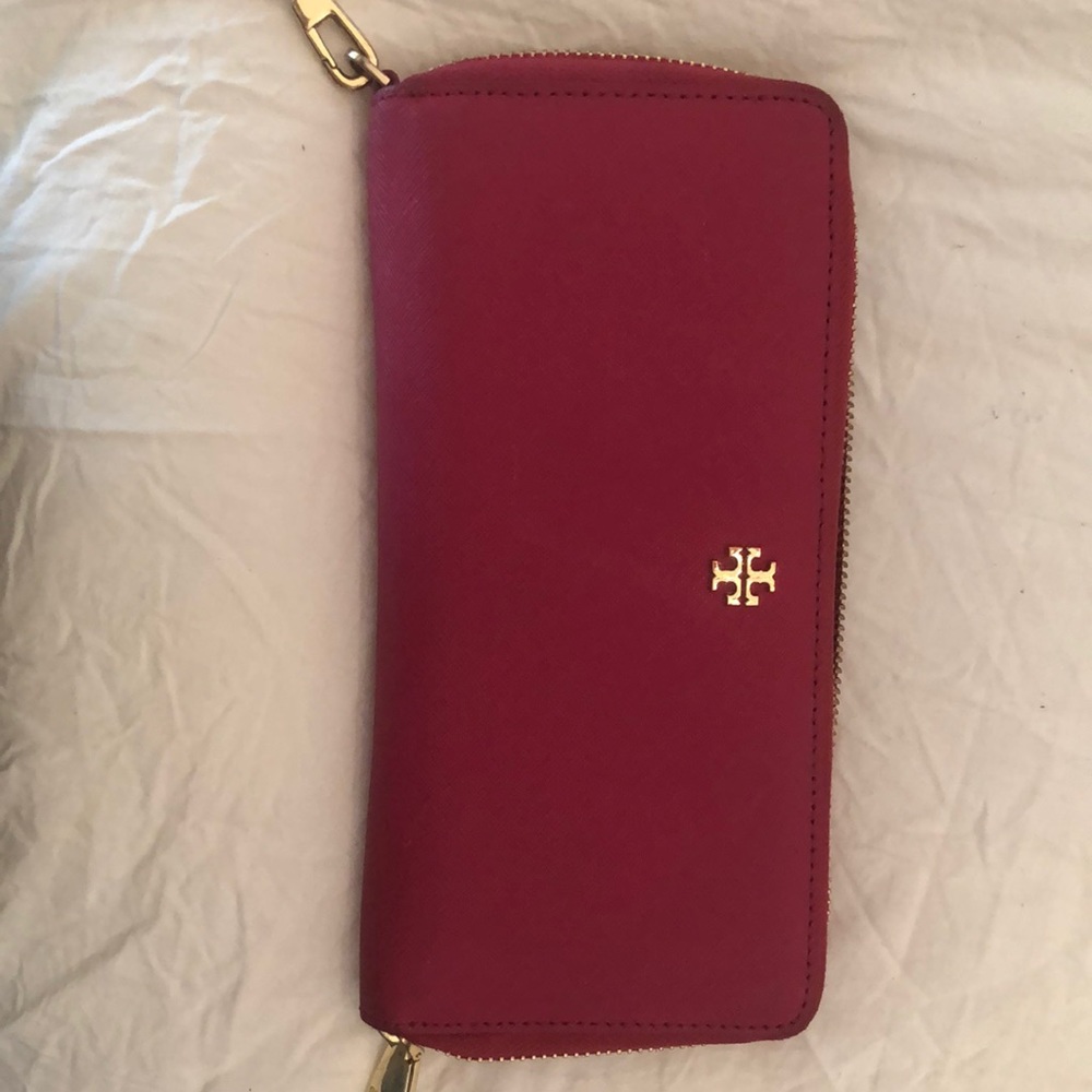 Bright pink Tory Burch wallet with strap